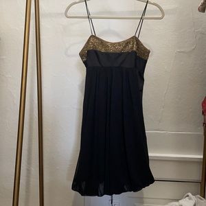 Black and gold holiday cocktail dress